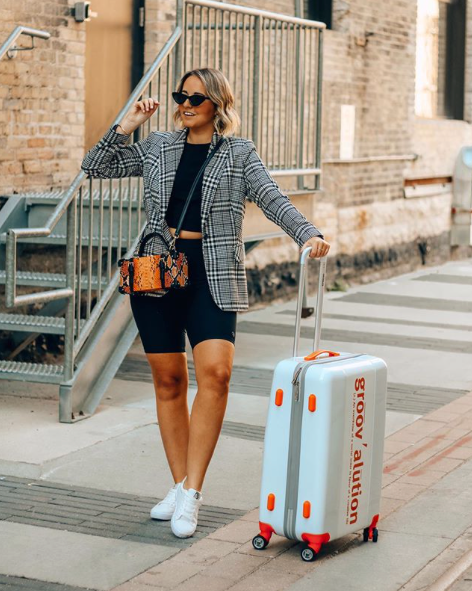 White & Orange Groovalution Suitcase